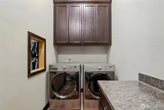 Main floor laundry with laundry shoot