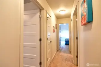 Hallway int the main floor between bderooms.