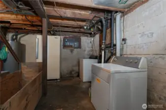 Unfinished basement with lots of possibility. Currently has the washer/dryer