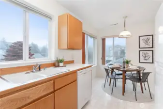 Enjoy eating with the morning and afternoon light in this corner of the kitchen.