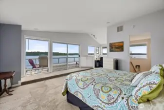 PRimary BR - waking up to views of water and Mt Rainier! Or having a glass of wine or cup of coffee on your private deck.