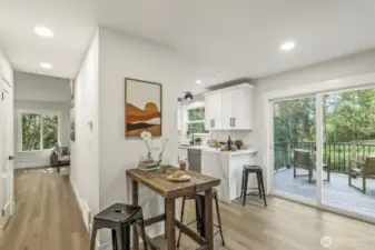 The family room connects seamlessly to the kitchen, with an oversized new Trex deck just off the family room—perfect for indoor-outdoor living.
