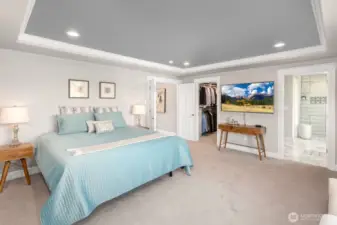 Primary bedroom with huge windows to capture the views and natural light!  Stunning 5 piece bathroom and walk in closet adjoins.