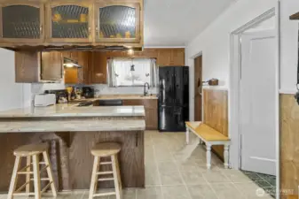 Kitchen featuring a stylish bar-style countertop, ideal for entertaining guests while preparing meals.