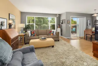 Another view of the light filled living room and the slider to the patio