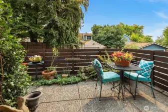 What a treat!  Sunny patio with access to parking