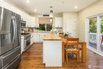 Step onto a full-length main floor deck from the kitchen.