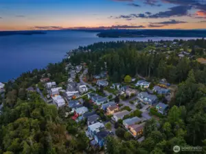 Aerial views of Goat Hill and Juanita Bay beyond, at twilight.
