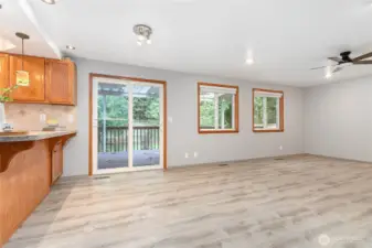 New slider doors to deck from both living area and dining rooms