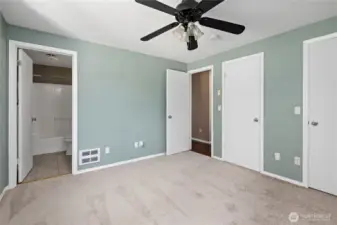 master bedroom with 2 separate closets
