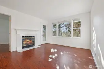 Large windows to lovely view of trees.