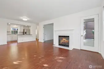 Living Room toward kitchen with patio door on right