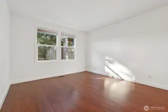 Primary bedroom with view to covered patio