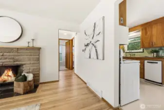 A glimpse down the hall to the bedrooms and bath.