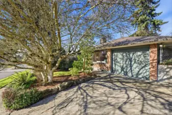 Two parking spaces in the driveway.  New garage door was installed in 2023.