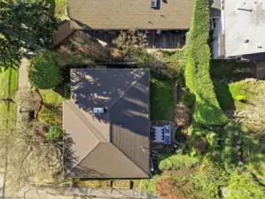 Love the drone shots!  This property has mature landscaping in the front and back, creating a private setting.
