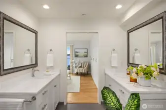 Double sink/vanities and spacious step-in tiled shower.
