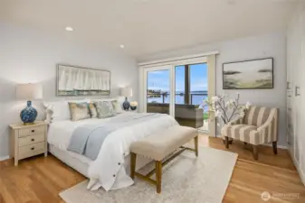 Primary Suite with sliding doors to deck.