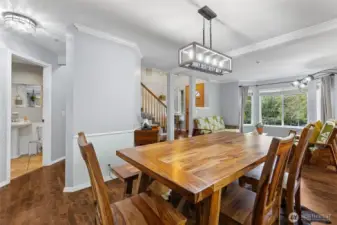 Spacious and inviting, this dining area offers an ideal setting for both everyday meals and special occasions.