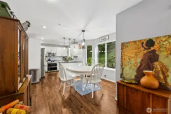 From the living room, enjoy an open view into the inviting nook and spacious kitchen.