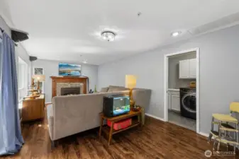 Looking from the nook toward the living room, the space feels airy, inviting, and ideal for everyday living or entertaining.