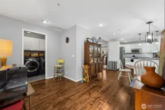 Open views from the living room into the nook and kitchen enhance the home’s connected layout.
