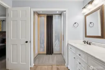 Ensuite Bath features a built-in custom closet for organized convenience.