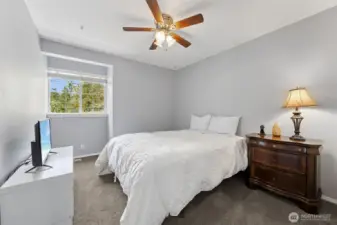 Comfortable and inviting, this bedroom offers privacy and room to make it your own.