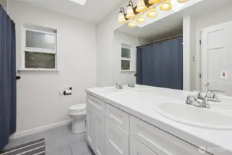 A well-appointed upstairs bathroom offering both style and convenience.