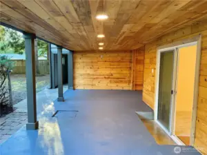 Covered patio -- the sliding glass door leads to primary bedroom.
