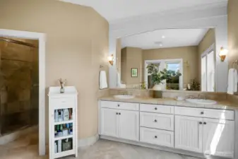 The bathroom is done in quiet neutral tones to create a peaceful environment.
