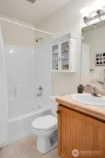 This is the full bath adjacent to the guestroom and laundry.