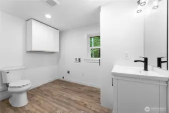 1/2 Bathroom & Laundry Room