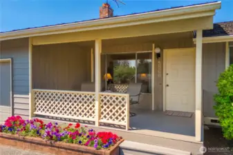 Enjoy the Summer from the comfort of your covered front porch…”hey neighbor”