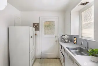 Main floor kitchen has outside access.