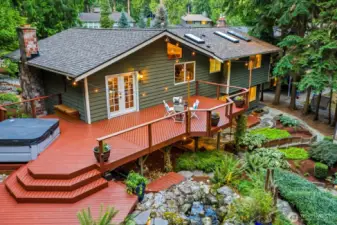 Backyard is an entertainer's dream. Huge deck, babbling brook water feature, hot tub, and a big yard that backs to a greenbelt.