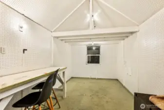 Oh, and there's even a bonus outbuilding with electricity and a full foundation that would make a perfect workshop, art studio, playhouse, etc.