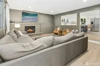 Living room off of the kitchen/dining with gas fireplace