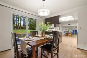 Open floorplan from the dining area to kitchen to lower level entertaining room.