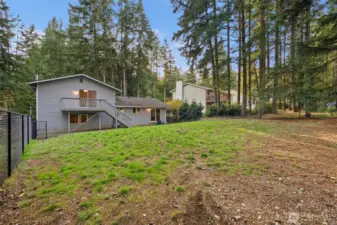 Your completely fenced backyard has lots of room for play, gardening and entertaining!