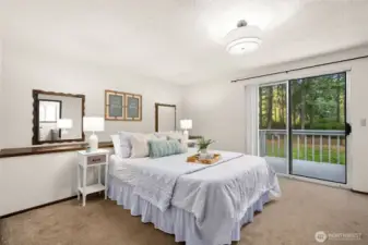 Primary features deck with stairs to backyard.