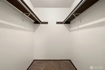 Walk-in closet in primary suite