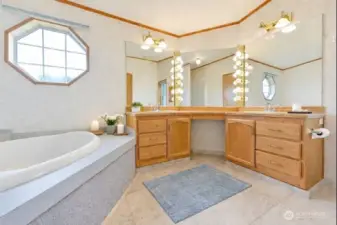 Primary bath. Staged using AI