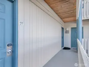 Separate entrances to both units. The building's "guest laundry" room is conveniently located outside unit 419.