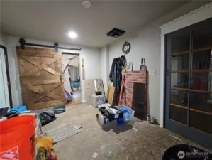 Sliding Barn Door leads to one of the ensuite b