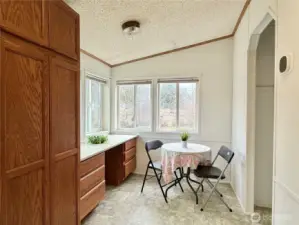 Close up of kitchen breakfast nook which overlooks the backyard.