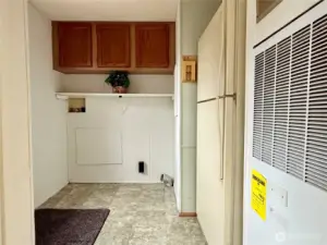 Utility/Laundry room, which leads to the deck to the backyard.