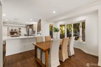 The dining area right off of the kitchen provides easy flow for entertaining