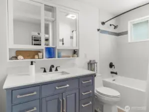 Primary. That shower is fully tiled and that tub is DEEP.