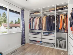 Walk in closet large enough for exercise equipment or small bed/daybed or additional sit-down vanity